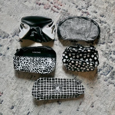 Bolsas de viaje vintage de maquillaje cosmético Lancome con cremallera x5 - bolsas de viaje blancas y negras Foto 1 de 4