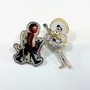 Lote de 2 prendedores comerciales Disney Ernesto Cruz Pixar Coco Miquel - Imagen 1 de 2