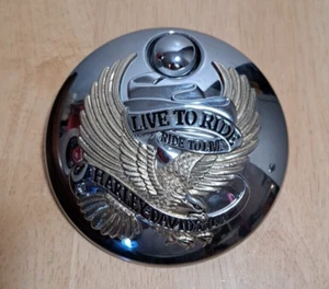 Puerta de combustible consola Harley Live to Ride to Live 61300049A/61335-09A - Imagen 1 de 9