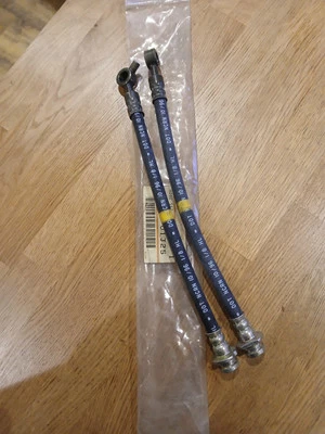 Nissan Patrol Y60, par de mangueras de freno delanteras flexibles, nuevas en paquete piezas originales. Foto 1 de 3