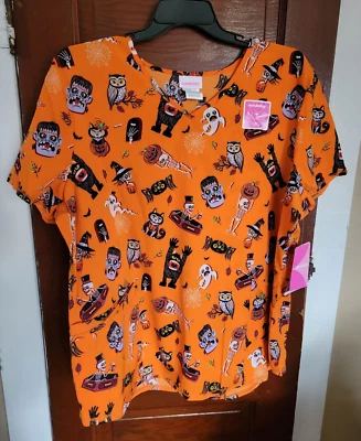 NWT Scrubstar Women's 2XL Orange Halloween Short Sleeve V Neck Scrub Top - Image 1 of 4