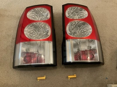 05-13 Land Rover LR4 Left Right Set Tail Lights & LR3 Conversion Resistors - Image 1 of 4
