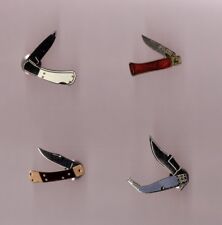 pin's couteau (signé démons et merveilles) existe en 4 versions