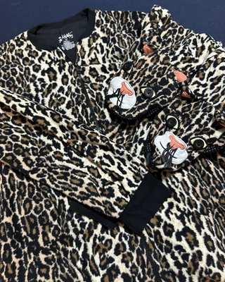 Pijama Nick and Nora de una pieza con patas estampado de leopardo talla S cara a pies guepardo Foto 1 de 4