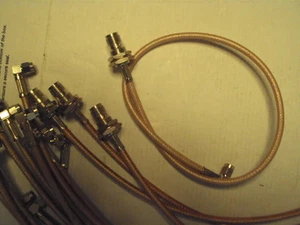 Jersey coaxial: mamparo SMA macho 90 grados a TNC hembra, 19 pulgadas de largo RG400/U sin usar - Imagen 1 de 1