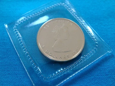 1987 1/10 унции Канада золотой кленовый лист $5 монета .9999 тонкий BU новом пластике #87ML47 - Изображение 1 из 4