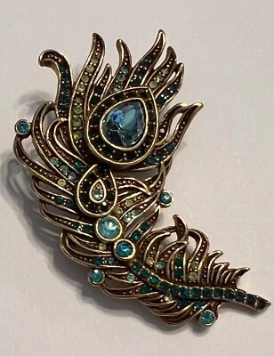Broche de plumas Heidi Daus con cristales azules y verdes brillantes Foto 1 de 2