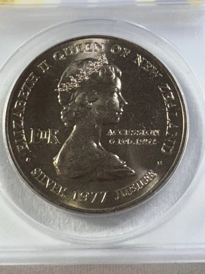 Nueva Zelanda 1977 1 dólar calificado como nuevo 68 por ANACS Waitangi Day Foto 1 de 4