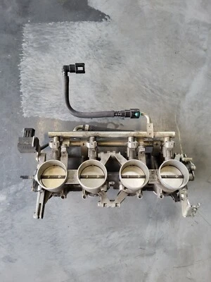 Carrocería del acelerador usada OEM 2006-2007 Suzuki GSXR600 13405-01H11 Foto 1 de 4