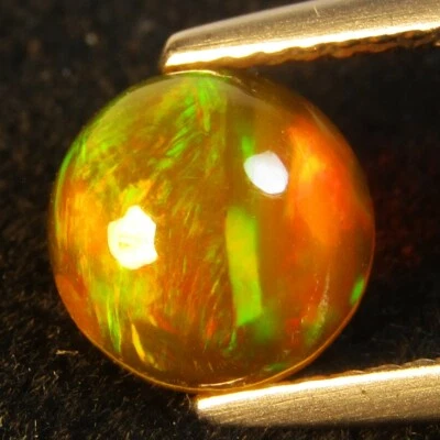 Piedra preciosa de forma redonda de ópalo amarillo juego de colores naturales de 1,20 quilates de Etiopía Foto 1 de 2