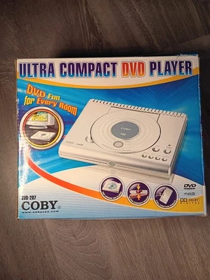 Coby Ultra Compact DVD Player DVD-207 with Full Function Remote New In Box - Image 1 of 3
