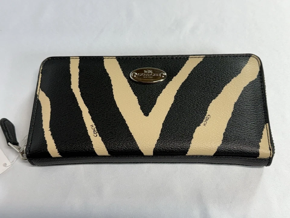 Cartera COACH Estampado Cebra Acordeón Cremallera Negra Multi/Plata Foto 1 de 4