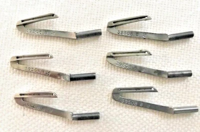 6 New Union Special 39508B Lower Loopers for 39500 Machines - Image 1 of 2