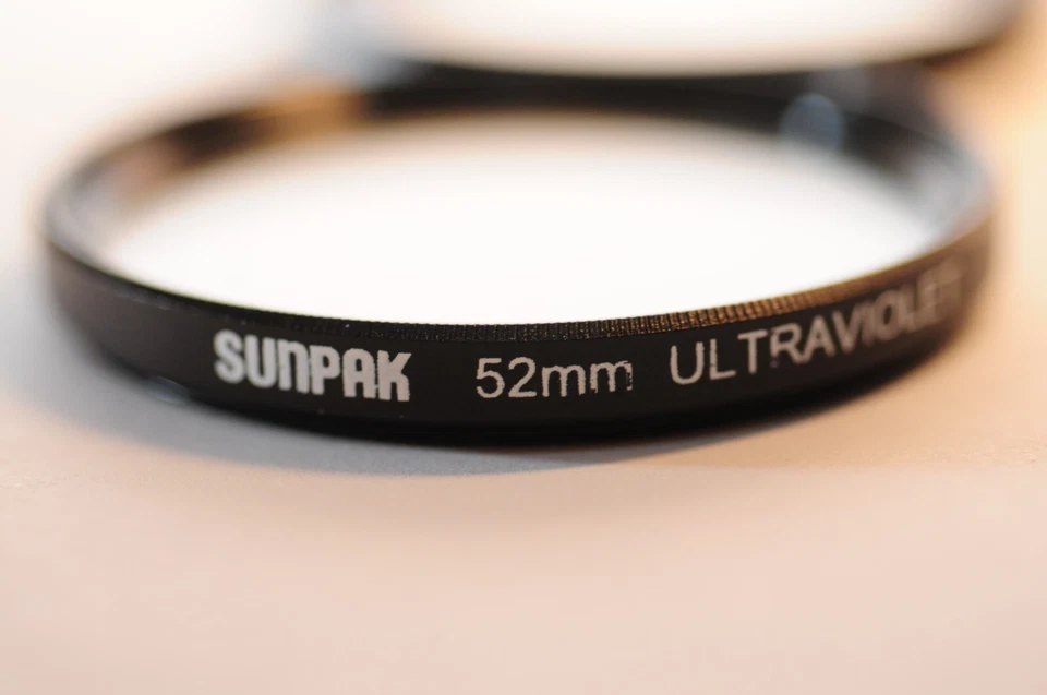 Sunpak 52mm UV Ultraviolet clear Filter for Nikon Canon Sony Tamron Sigma lens - Image 1 of 4
