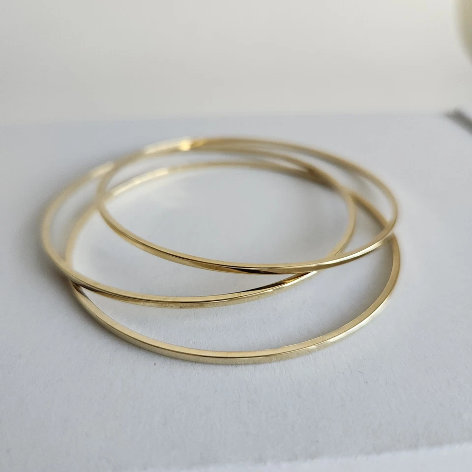 Juego de 3 Pulseras Brazalete Tono Dorado | 8.25" | Juego Clásico Apilable Foto 1 de 4