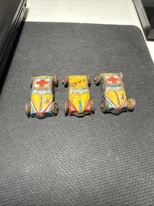 Menge 3 Vintage 1,5" Japan 2 x Krankenwagen A-12 & Taxi 123 Blechspielzeug mit Rädern - Bild 1 von 6
