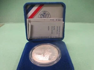 1986 US Liberty Coin ~ Ellis Island 90% Silver Dollar  - Uncirculated - Picture 1 of 3