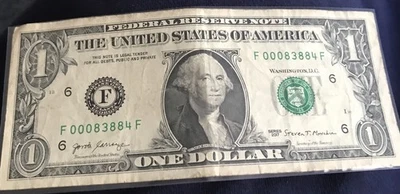 one dollar bill. Zip Code For Post Falls, ID. 83884. 2017 - Image 1 of 2