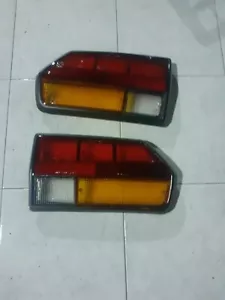 ALFA ROMEO ALFETTA GTV 2000 COPPIA DI PLASTICHE FANALI POSTERIORI NUOVE - Foto 1 di 1