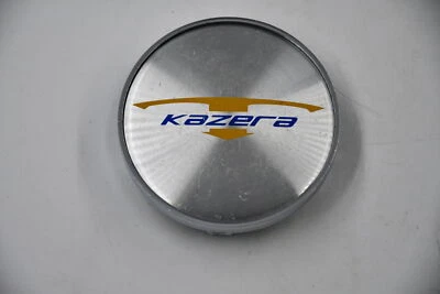 Tapacubos tapacubos Kazera borde cromado, centro mecanizado, logotipo amarillo y azul Foto 1 de 3