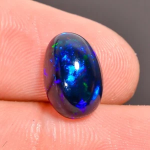 Natural Black Ethiopian Opal Oval Shape Fire Cabochon Gemstone 11X7X4 mm 2.45 Ct - Picture 1 of 3