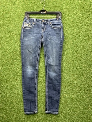 Pantalones de mezclilla Miss Me para mujer 25 azules firma ajustados adornados con solapa bolsillos Foto 1 de 4