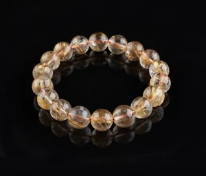 Flyshop Gioielli Bracciale Cristallo Titanio Naturale, Oro (Dia. 11 mm) - Foto 1 di 11