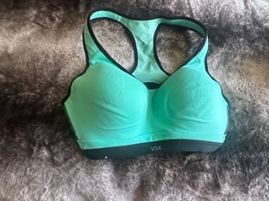 Sujetador deportivo Victorias Secret VSX verde azulado negro 36DD excelente estado - Imagen 1 de 2