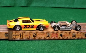 Tyco '79 Camaro Yellow Orange Black Stripe Z28 HP2 Slot Car 6977 w Bonus Chasis - Picture 1 of 21