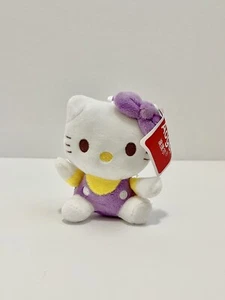Sanrio Hello Kitty Plush Clip Keychain Aoger 4” Purple Overalls Yellow Shirt New - Picture 1 of 5