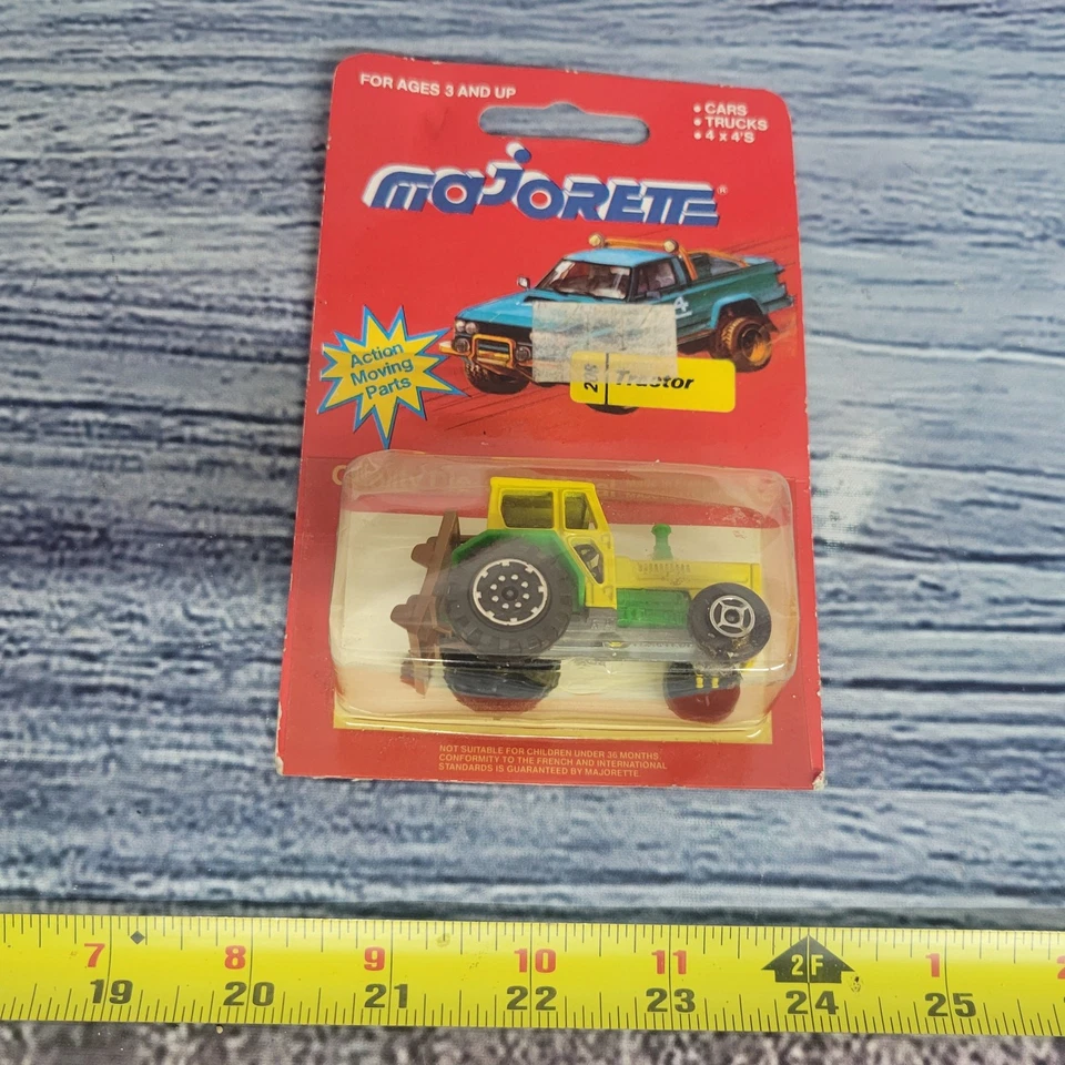 Majorette 1/64 Scale die-cast green and yellow tractor sealed - Image 1 of 4