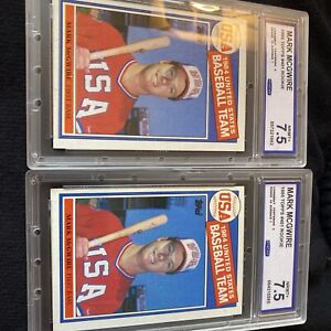 two 1985 topps mark mcgwire Rookies Both A CCG 7.5