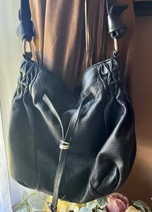 Elliott Lucca Pebbled Leather Drawstring Shoulder Bag. Black - Picture 1 of 7