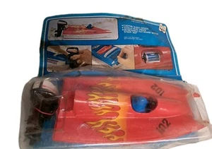 Motor fueraborda de juguete y bote de juguete Nasta hecho en Hong Kong Woolworth años 70 nuevo de stock - Imagen 1 de 16