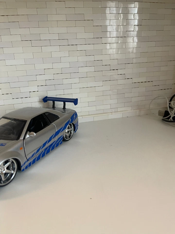 jada toys NISSAN SKYLINE GT-R 2002 FAST & FURIOUS METALLIC BLU 1:24 - Immagine 1 di 4