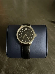SWAROVSKI WOMEN'S DREAMY BLACK LEATHER CRYSTAL DIAL WATCH - Picture 1 of 9