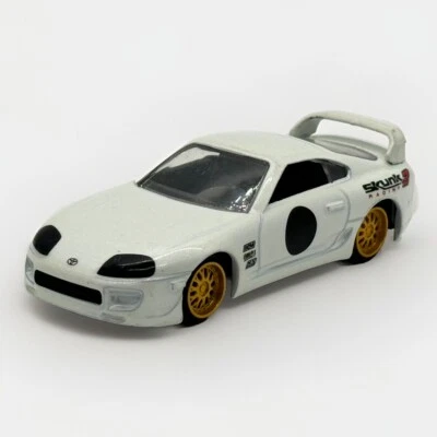 Jada Toys/Sintonizadores JDM/ 1995/Toyota Supra/Blanco con ruedas doradas/Carreras de mofeta (B1) Foto 1 de 4