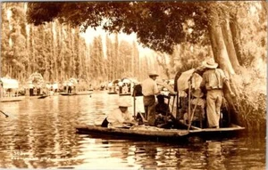 RPPC, Mexico City, Mexico  CANALS OF XOCHIMILCO  Men On Rafts  ca1940's Postcard - Picture 1 of 2