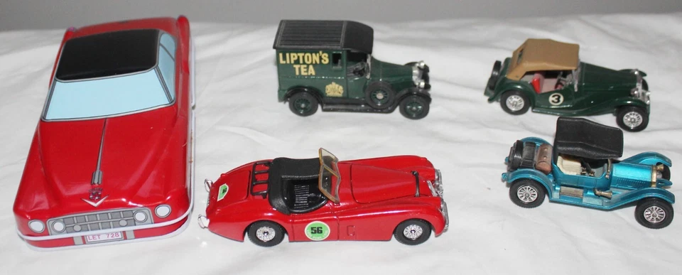 VINTAGE LOT 5 CARS CORGI JAGUAR MATCHBOX STUTZ 1945 MG '77 LIPTON TEA CADILLAC - Image 1 of 1