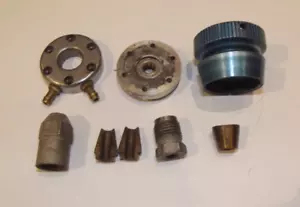 OS MAX 21 FSR-M HEADS, FLYWHEEL, COLLET, NUTS AND SHAFT HOLDERS FOR NITRO BOAT - Picture 1 of 3