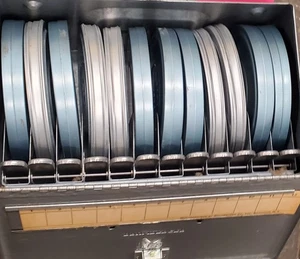 Brumberger Film Case with 8mm home movies, there are 12 slots 10 have film - Picture 1 of 13