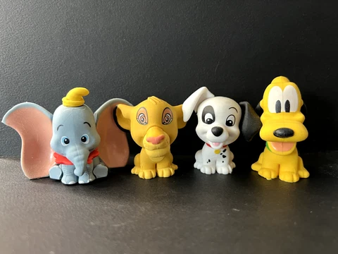 Lot of FOUR Disney Puzzle Palz Erasers (Simba, Pluto, Dumbo, and Patch) Cover