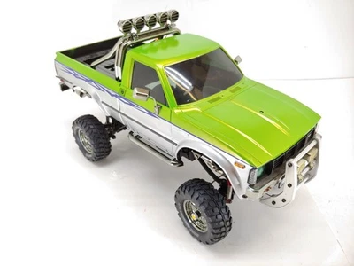 Tamiya 1/10 Toyota Hilux HIGH LIFT Hardbody ARTR Truck w/ 3-Gear Transmission - Image 1 of 4