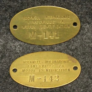 2 Rockwell International Linesville PA Motor ID Brass Tag Fobs M-141 M-142 2"  - Picture 1 of 2