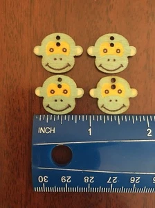 4 adorables botones de mono de madera - Imagen 1 de 1