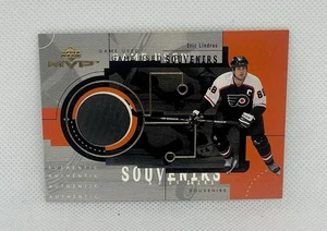 1999-00 Upper Deck Gold Reserve Game-Used Souvenirs Eric Lindros Puck #GU9 - Picture 1 of 4