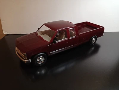 1/25 AMT ERTL 1995 CHEVROLET C1500 EXTENDED CAB DARK GARNET RED PROMO - Image 1 of 4