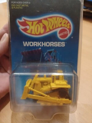 CAT Bulldozer YELLOW #1172 Hot Wheels Workhorses Mattel 1988 Unpunched Card - Image 1 of 3