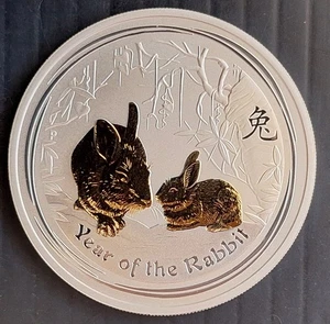 2011 Australia Year of the Rabbit 1 oz  Silver (.999) $1 partly gilt UNC Coin - Picture 1 of 2