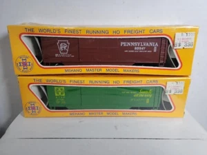 Mehano HO Scale Santa Fe A.T.S.F. 67392 & Pennsylvania Rail Road 83247 - Picture 1 of 8